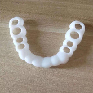 Couverture de dents artificielles pour un sourire parfait.